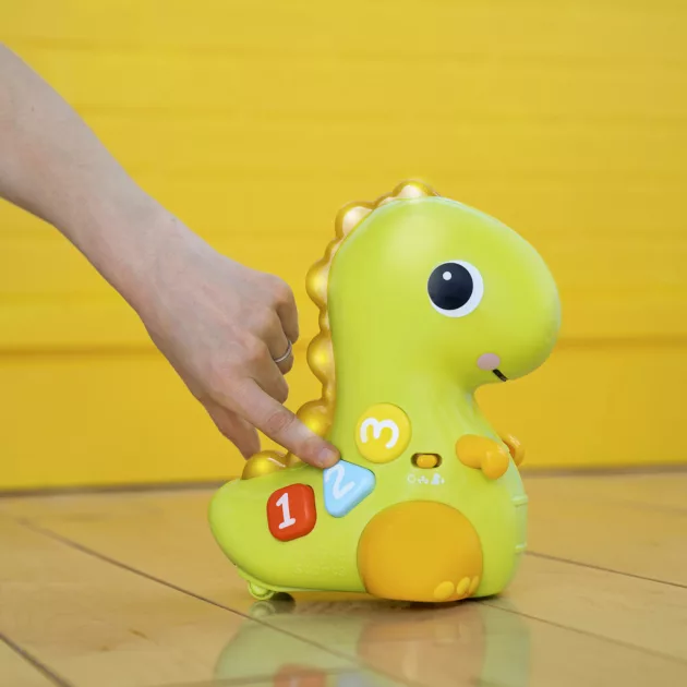 Bright Starts Játék zenélő, világító, mozgó dino, 6 hó+