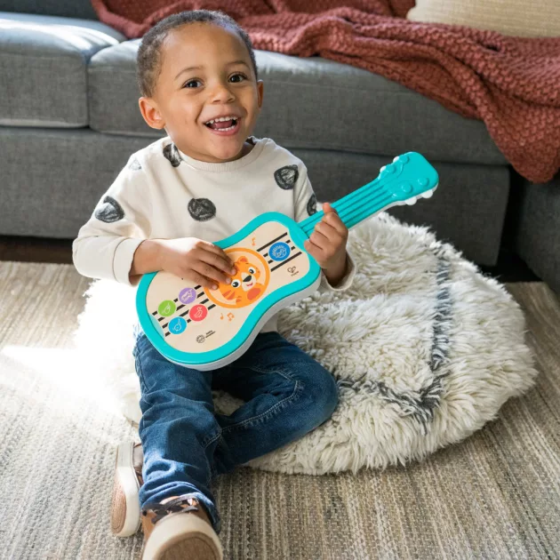 Baby Einstein Zenélő fajáték ukulele Magic Touch HAPE - 6hó+
