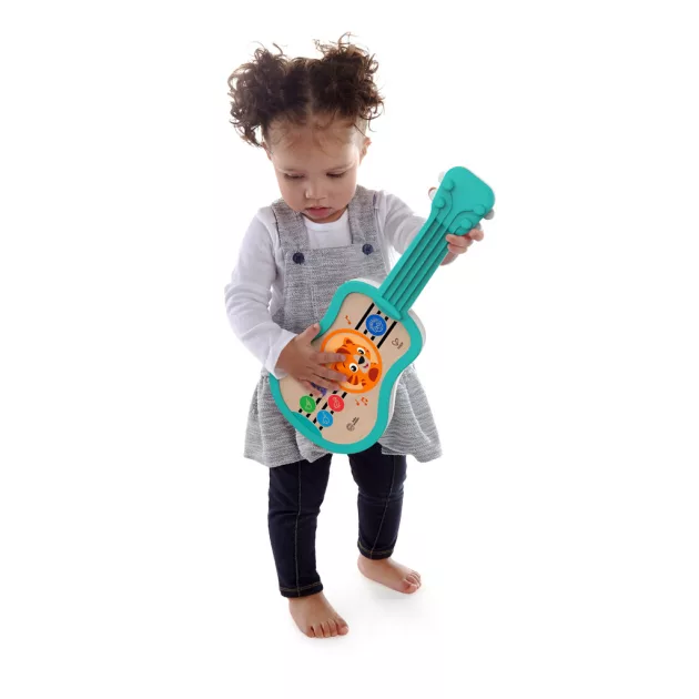 Baby Einstein Zenélő fajáték ukulele Magic Touch HAPE - 6hó+