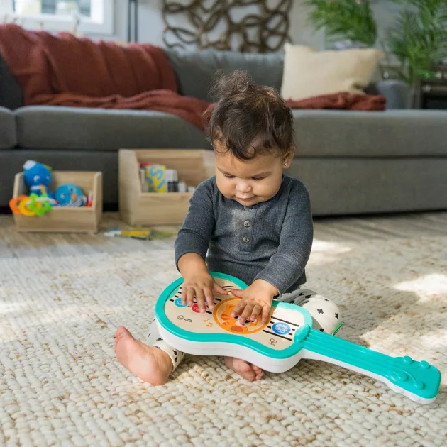 Baby Einstein Zenélő fajáték ukulele Magic Touch HAPE - 6hó+