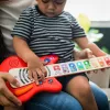 Baby Einstein Fa zenélő játék gitár Together in Tune Guitar™ Connected Magic Touch™ HAPE - 6hó+