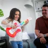 Baby Einstein Fa zenélő játék gitár Together in Tune Guitar™ Connected Magic Touch™ HAPE - 6hó+