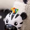 Baby Einstein Rágóka csörgővel zebra Zen™ Shake-a-Shape BPA mentes - 0hó+